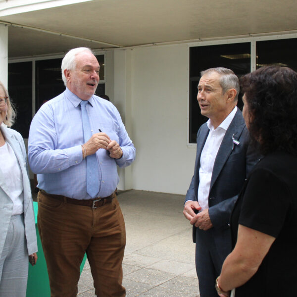 The Hon. Roger Cook MLA speaks with Mr Tills surrounded by Lisa O'Malley MLA and Principal Kylie Bottcher with the school captain in the background.